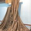 Handloom soft cotton saree with embroidery work in tussar brown color. This handloom soft cotton saree is a perfect blend of style and comfort.