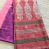 handloom cotton jamdani saree in magenta purple color wirh matching blouse piece. this is a very soft cotton saree. beat the heat with this summer friendly cotton jamdani saree, this saree style is perfect for summer in India fashion. shop online shop now. saree sale at offer price.