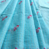 Experience the perfect blend of tradition, style, and comfort with this sky blue colour handloom pure cotton by cotton saree. Elevate your festive wardrobe with this timeless masterpiece. Crafted from pure handloom cotton, it’s not only lightweight and summer-friendly but also incredibly comfortable to wear all day long. Complete your look with the included embroidered contrast blouse piece. Shop online this beautiful handloom pure cotton saree with exquisite embroidery work.