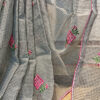 Handloom resham by cotton checks saree with embroidery work on grey color. A small and pretty floral motif has been neatly embroidered
