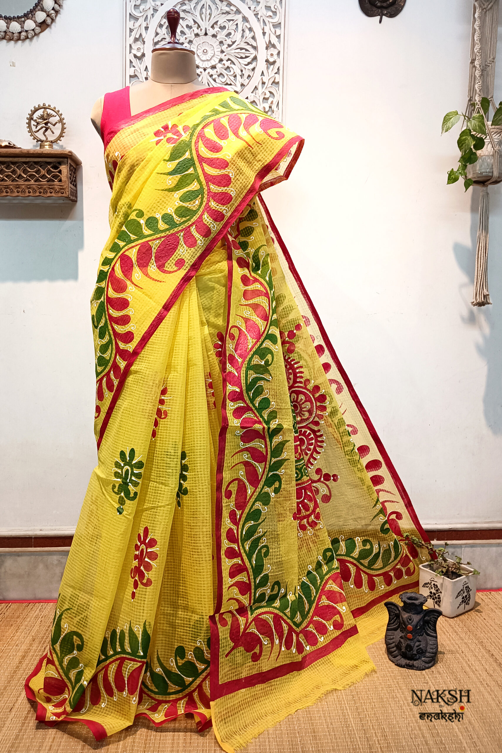 Hand painted resham by cotton checks saree. resham check saree. hand painted saree. cotton saree. yellow saree