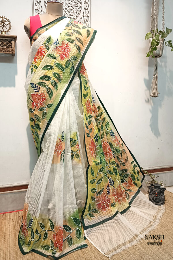 Hand painted resham by cotton checks saree. resham check saree. hand painted saree. cotton saree.