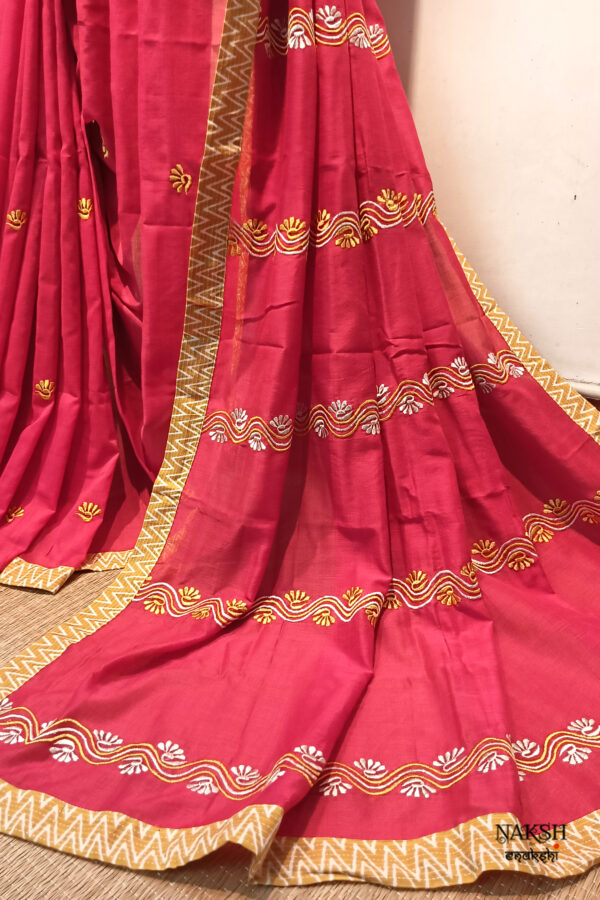 Red embroidered handloom soft cotton saree.This handloom soft cotton saree is a captivating blend of style and comfort. The beautiful floral motif embroidery, neatly done.