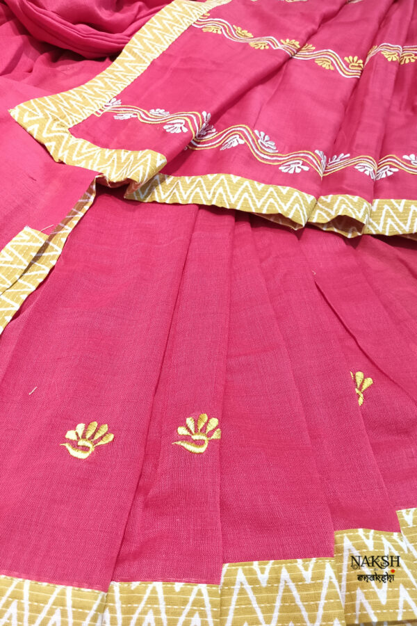 Red embroidered handloom soft cotton saree.This handloom soft cotton saree is a captivating blend of style and comfort. The beautiful floral motif embroidery, neatly done.
