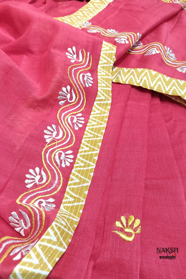 Red embroidered handloom soft cotton saree.This handloom soft cotton saree is a captivating blend of style and comfort. The beautiful floral motif embroidery, neatly done.