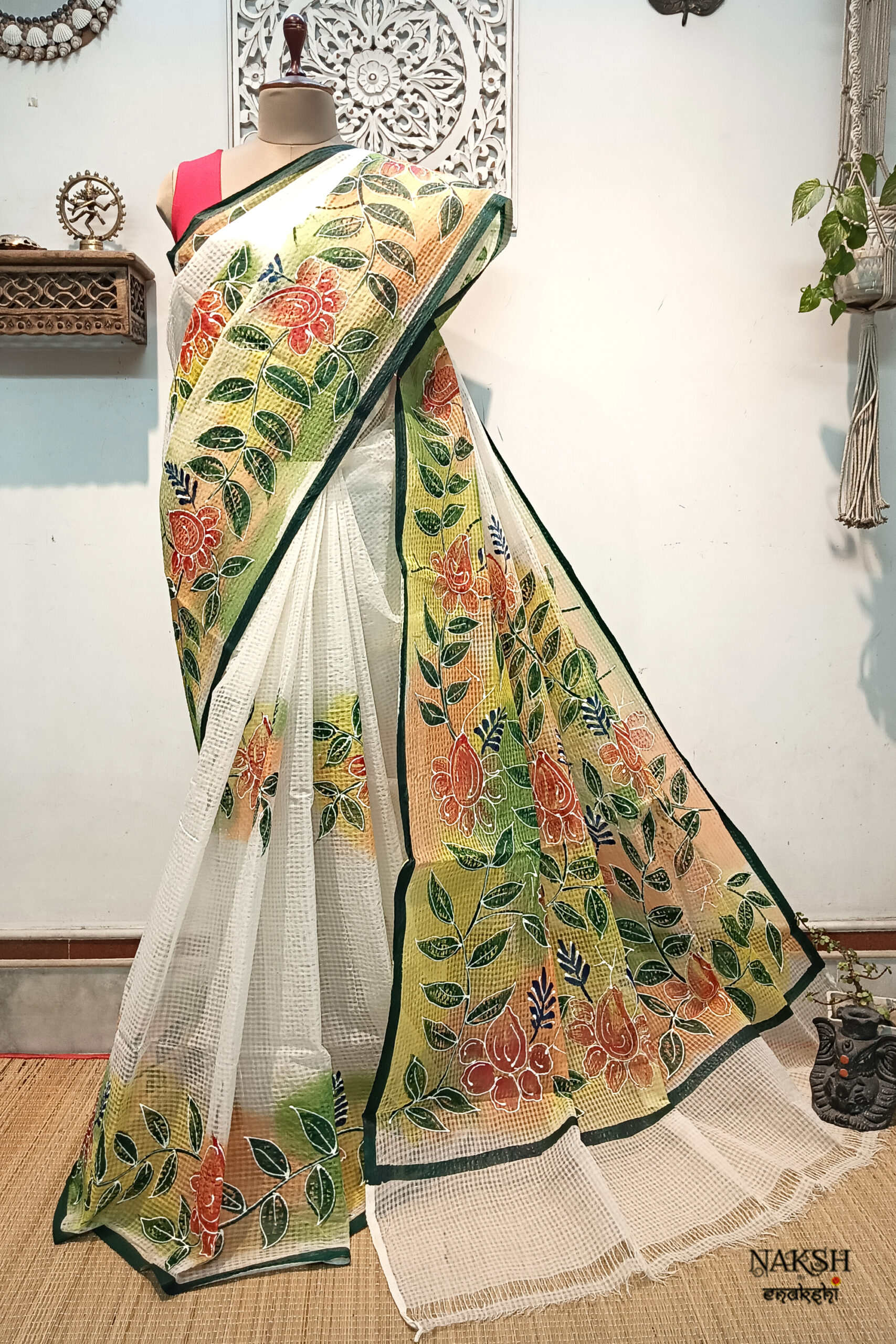Hand painted resham by cotton checks saree. resham check saree. hand painted saree. cotton saree.