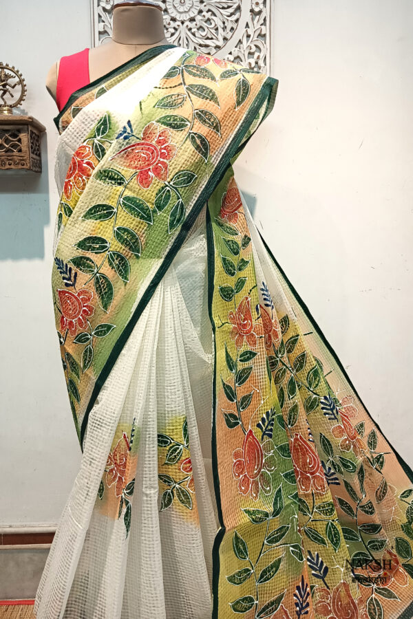 Hand painted resham by cotton checks saree. resham check saree. hand painted saree. cotton saree.