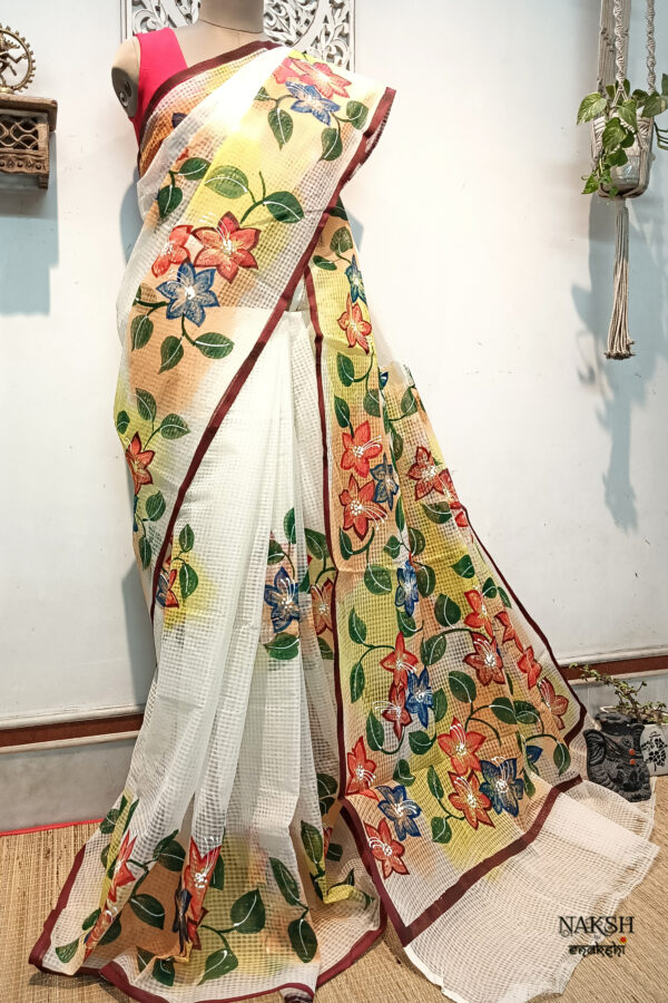 Hand painted resham by cotton checks saree. resham check saree. hand painted saree. cotton saree.