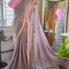 Smoky mauve pure cotton handloom saree with multicolor embroidery motifs gold pink scallop border and contrast bubblegum pink embroidered blouse piece displayed on mannequin by Naksh by Enakshi